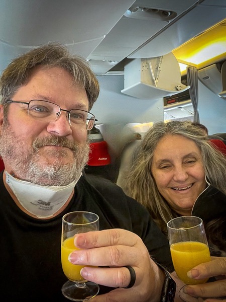 On-board our first flight with complimentary champagne. What a way to start our journey! via Instagram [Photography]