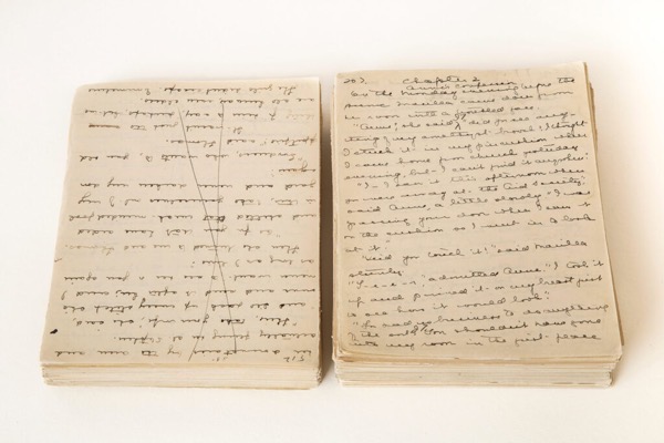The image shows two stacks of handwritten pages, likely from an old manuscript or notebook. The pages are yellowed and show signs of age, with some creases and discoloration. The handwriting is in cursive, with ink that has darkened over time, suggesting the pages are quite old. The text is densely written, with no visible headings or titles, and the pages are filled with text from top to bottom. The left stack has a visible crack running through the middle, indicating some damage. The right stack is labeled Chapter 2 at the top, suggesting it is part of a larger work. The text appears to be in English, with some words underlined, possibly for emphasis or correction. The pages are bound together, with the edges slightly frayed, and the overall condition suggests they have been preserved for a long time.</p>

<p>Provided by @altbot, generated privately and locally using Ovis2-8B