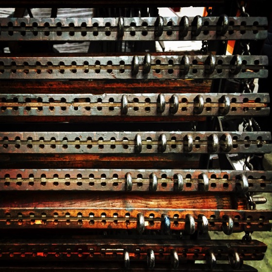 Pattern control pegs (like a computer program) on Turn of the Century Loom