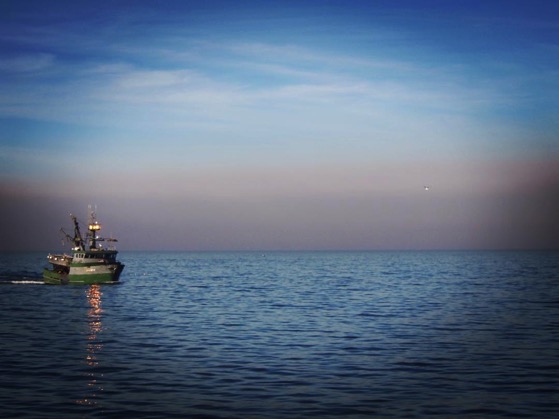 Fishing boat and smoke plume on way to Santa Cruz Island via Instagram