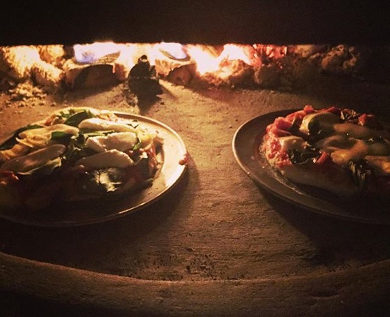Pizza — my favorite food — In our friends new pizza oven 🍕 via Instagram