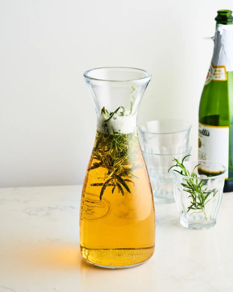 Pitcher Cocktail Recipe: Sparkling Rosemary Cider via Kitchn