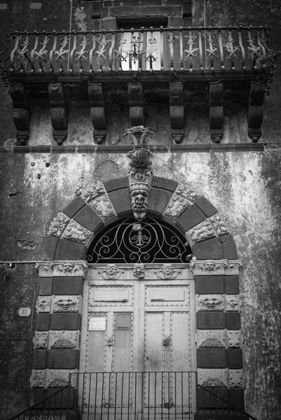 Faces on the Doorway, Pedara, Sicily, Italy  [Photography] [Prints]